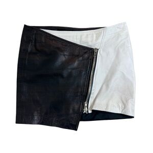 Nicholas leather asymmetrical black and white mini skirt. Size 8